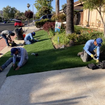 Preferred Turf - Putting 5" nails every 4" of seams and edges - Artificial Turf Near Me Preferred Turf - Putting 5" nails every 4" of seams and edges - Artificial Turf Near Me