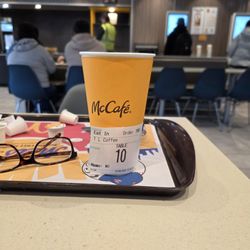 McDonald's - One large coffee, 5 minutes, not busy, kiosk service only, end of days