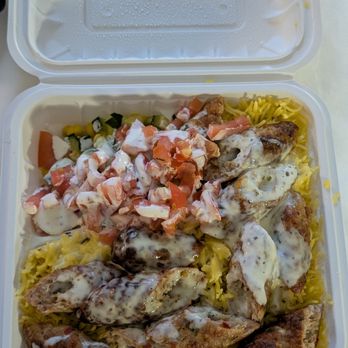 New York Gyro - Kofta kebab dinner with rice, and cucumbers, tomatoes, and corn - Mediterranean Near Me - Minneapolis, Minnesota New York Gyro - Kofta kebab dinner with rice, and cucumbers, tomatoes, and corn - Mediterranean Near Me - Minneapolis, Minnesota