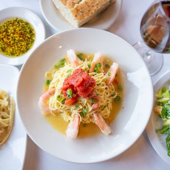 Amerigo Italian Restaurant - a plate of pasta with shrimp and vegetables - Italian Near Me - Jackson, Mississippi Amerigo Italian Restaurant - a plate of pasta with shrimp and vegetables - Italian Near Me - Jackson, Mississippi