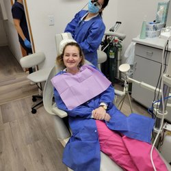 Kolodner Dental Group - Dr Teresa cleaning Dr Tatyana's teeth