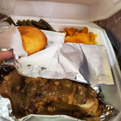 Mugshots Bar & Grill - Smothered pork chops with yams and green beans. Really good flavor.