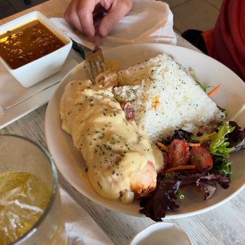 Las Casitas Latin Restaurant - Chorizo-infused chicken breast clothed with bacon and cheese. - Puerto Rican Near Me - Orlando, Florida Las Casitas Latin Restaurant - Chorizo-infused chicken breast clothed with bacon and cheese. - Puerto Rican Near Me - Orlando, Florida