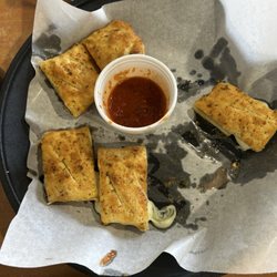 Cheesy Garlic Bread with marinara sauce.