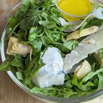 Fuoco Pizzeria Napoletana - Rucolina Salad: Baby arugula, artichoke, shaved parmigiano, extra virgin olive oil, lemon juice. - Pizza Near Me - Fullerton, California Fuoco Pizzeria Napoletana - Rucolina Salad: Baby arugula, artichoke, shaved parmigiano, extra virgin olive oil, lemon juice. - Pizza Near Me - Fullerton, California