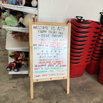 American Thrift - The discount board showing various discounts on the different colored tag items. - Thrift Stores Near Me - Cutler Bay, Florida