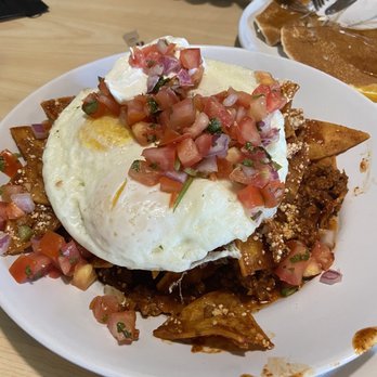 Two Chicks - Chilaquiles with over-easy eggs. - Breakfast & Brunch Near Me - Reno, Nevada Two Chicks - Chilaquiles with over-easy eggs. - Breakfast & Brunch Near Me - Reno, Nevada