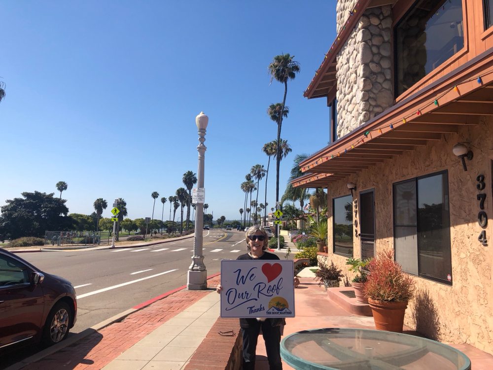 Slide of The Roof Masters