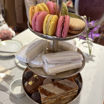 Ladurée - The top tower are the macaroons. The next one down are the finger sandwiches. The bottom tier is the pastry choice. - French Near Me - Washington, DC, District of Columbia Ladurée - The top tower are the macaroons. The next one down are the finger sandwiches. The bottom tier is the pastry choice. - French Near Me - Washington, DC, District of Columbia