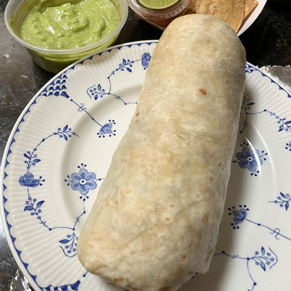 Carne Asada Super Burrito. The guac is excellent! Carne Asada Super Burrito. The guac is excellent!