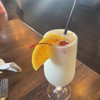 Sculley's - Piña colada made with a mix. - Seafood Near Me - Madeira Beach, Florida Sculley's - Piña colada made with a mix. - Seafood Near Me - Madeira Beach, Florida