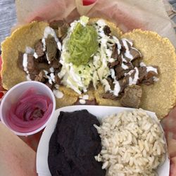 Tacos Carne Asada with pickled onions from the salsa bar