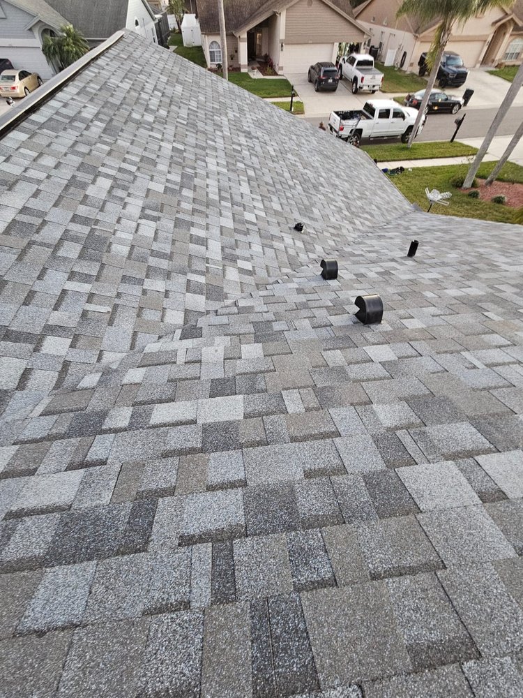 Slide of SolyMar Roofing