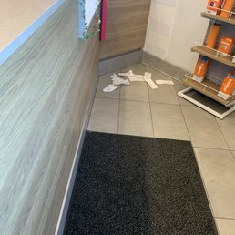 This was one section and not the other half with more garbage on floor.