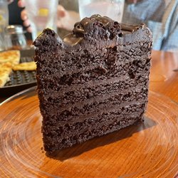 Marioochi’s Pizzeria - Six-layer chocolate cake - so moist and decadent!