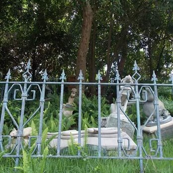 Haunted Mansion - Pet cemetery, Mr.Toad in the upper left. - Haunted Houses Near Me - Orlando, Florida