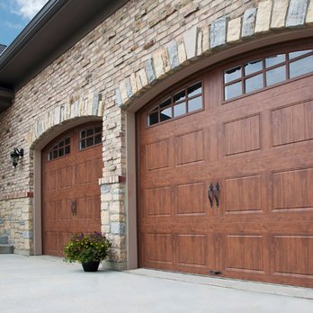 Pioneer Overhead Door 3G - Clopay Gallery door, Ultragrain Oak Dark with ARCH1 with Grilles - Garage Door Services Near Me - Lincoln, Nebraska Pioneer Overhead Door 3G - Clopay Gallery door, Ultragrain Oak Dark with ARCH1 with Grilles - Garage Door Services Near Me - Lincoln, Nebraska