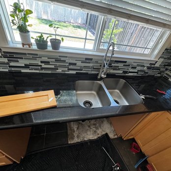 WaveGuard Water Damage Restoration - Under the sink cabinet and dishwasher removed. - Damage Restoration Near Me - San Jose, California WaveGuard Water Damage Restoration - Under the sink cabinet and dishwasher removed. - Damage Restoration Near Me - San Jose, California