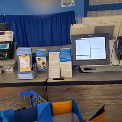 Walmart Supercenter - ABSOLUTELY no one in the customer service area. Lights out, and the area was closed. Someone finally came to help me at 7:25.
