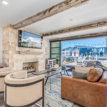 Holland Custom Builds - Open floor plan with old barnwood beams - General Contractors Near Me Holland Custom Builds - Open floor plan with old barnwood beams - General Contractors Near Me
