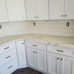 ARC Construction & Remodeling - Kitchen cabinets and backsplash.