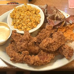 Chicken Critters with a side of Honey Mustard, Corn, and a Sweet Potato with Honey Butter (dug in early) Chicken Critters with a side of Honey Mustard, Corn, and a Sweet Potato with Honey Butter (dug in early)