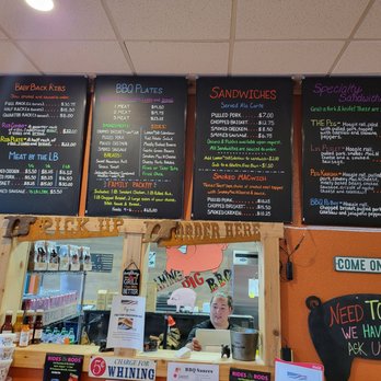 Flaming Pig BBQ - menus on the wall - Food Trucks Near Me - Tumwater, Washington