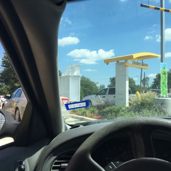 McDonald's - a view of a gas station from inside a car - Fast Food Near Me - Sherman, Texas