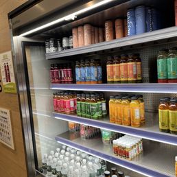 Cooler filled with fresh juices and other beverages. Cooler filled with fresh juices and other beverages.