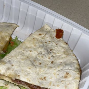 Frontera Tacos & Tequila - There's a long black course hair sticking out of the quesadilla! - New Mexican Cuisine Near Me - Middletown, New York