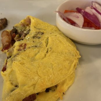 The Artisan - Artisan Omelette with the onions and peppers on the side. - Breakfast & Brunch Near Me - Durant, Oklahoma The Artisan - Artisan Omelette with the onions and peppers on the side. - Breakfast & Brunch Near Me - Durant, Oklahoma