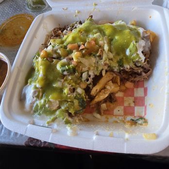 Birria On Broadway - Birria Fries I added the on green sauce but they came prepared with onions, tomatoes, cilantro, cream and guacamole. - Tacos Near Me - Los Angeles, California Birria On Broadway - Birria Fries I added the on green sauce but they came prepared with onions, tomatoes, cilantro, cream and guacamole. - Tacos Near Me - Los Angeles, California