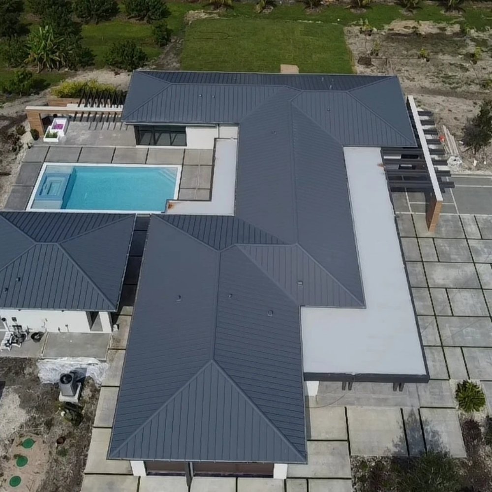 Slide of Molina's Roofing Services