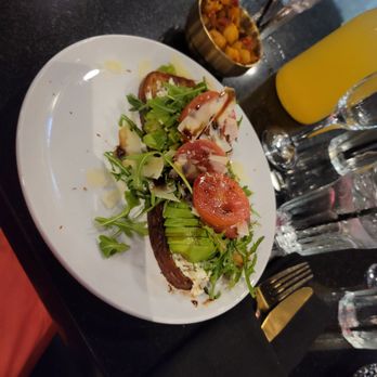 Kiss - Avocado Toast and Home Fries - New American Near Me - Houston, Texas Kiss - Avocado Toast and Home Fries - New American Near Me - Houston, Texas