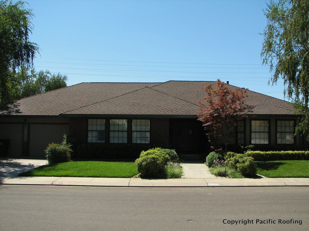 Slide of Pacific Roofing