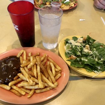 Pelican's Perch Bar & Grill - Hamburger Steak (hold the mushroom and onions) with sides of fries and Caesar salad. - American Near Me - Ocean Isle Beach, North Carolina Pelican's Perch Bar & Grill - Hamburger Steak (hold the mushroom and onions) with sides of fries and Caesar salad. - American Near Me - Ocean Isle Beach, North Carolina
