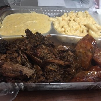 Smoking Kow BBQ - Pulled brisket & sausage with jalapeño grits & mac and cheese. - Food Trucks Near Me Smoking Kow BBQ - Pulled brisket & sausage with jalapeño grits & mac and cheese. - Food Trucks Near Me