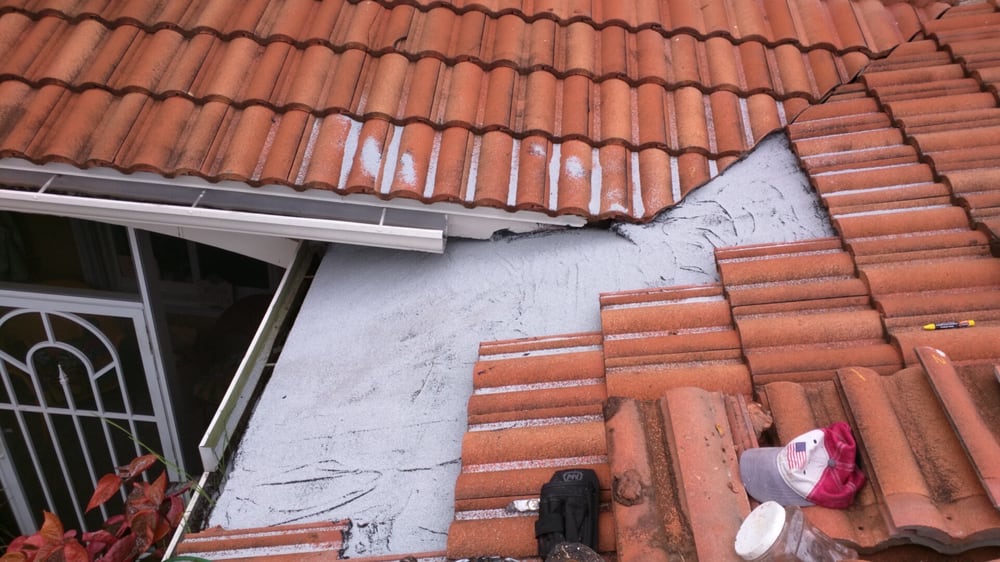 Slide of Riggs Roofing