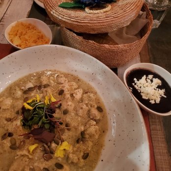 Xola Mexican Food - $25.50 - Polle en Pipian: Farm raised chicken cooked with a pumpkin seed, tomatillo with pablano sauce, served with rice and beans. - Mexican Near Me - Toronto, Ontario