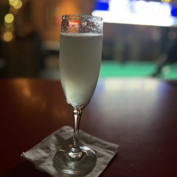 The Famous Bar - a glass of white wine - Bars Near Me - Saint Louis, Missouri