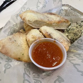 NAPO Today's Pizza - Garlic bread (5 pieces) with a side of marina sauce and artichoke dip - Pizza Near Me - McAllen, Texas NAPO Today's Pizza - Garlic bread (5 pieces) with a side of marina sauce and artichoke dip - Pizza Near Me - McAllen, Texas