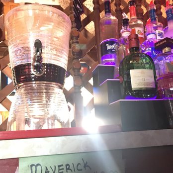 Maverick Inn - a bar with liquor bottles and a sign - Nightlife Near Me - Yuma, Arizona