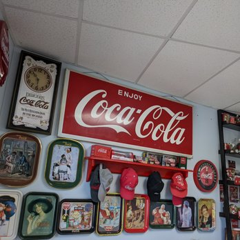 Roni's Chinook Deli & Pizza - a coca cola sign - Pizza Near Me - Willow, Alaska