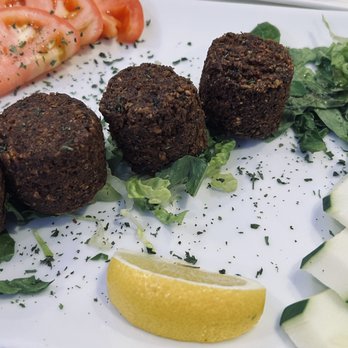 Gyro Bar - Falafel appetizer (after we gobbled down 3 of the 7 balls). - Greek Near Me - Oceanside, New York Gyro Bar - Falafel appetizer (after we gobbled down 3 of the 7 balls). - Greek Near Me - Oceanside, New York