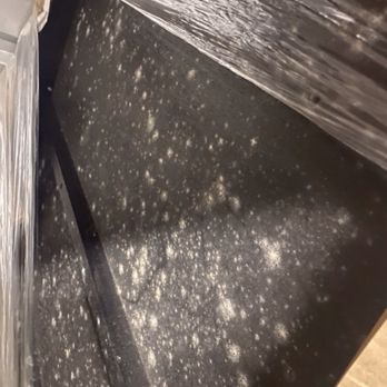 Midgard Self Storage - Treasured coffee table covered in mold. - Self Storage Near Me - Cumming, Georgia