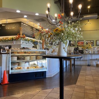 Russell’s Cafe & Bakery - Such a cute interior full of flowers, cake, gooey butter cake and self serve hot coffee - Breakfast & Brunch Near Me - Fenton, Missouri Russell’s Cafe & Bakery - Such a cute interior full of flowers, cake, gooey butter cake and self serve hot coffee - Breakfast & Brunch Near Me - Fenton, Missouri