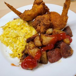 Wingz & Wafflez - Fried chicken, homefries, and scrambled eggs.