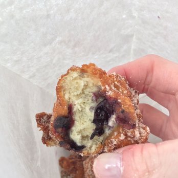 Dondero Orchards - A bite out of a blueberry fritter. - Farmers Market Near Me - Glastonbury, Connecticut Dondero Orchards - A bite out of a blueberry fritter. - Farmers Market Near Me - Glastonbury, Connecticut