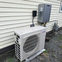 Parker Bros Heating and Cooling - Outdoor unit and wall units