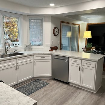 SBV Renovations - a kitchen with white cabinets and marble countertops - General Contractors Near Me SBV Renovations - a kitchen with white cabinets and marble countertops - General Contractors Near Me